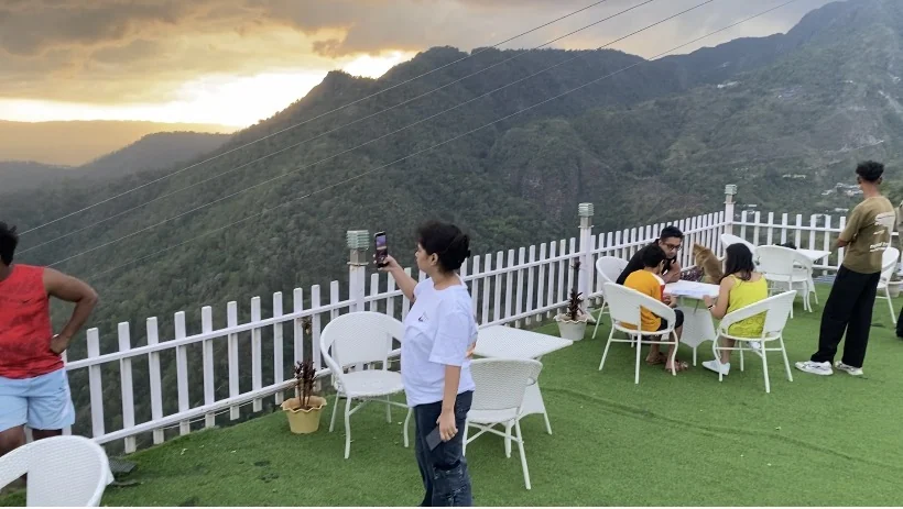 The resort terrace looking out towards the surrounding green hills